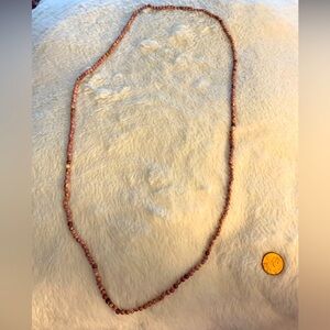 Long pink beaded necklace